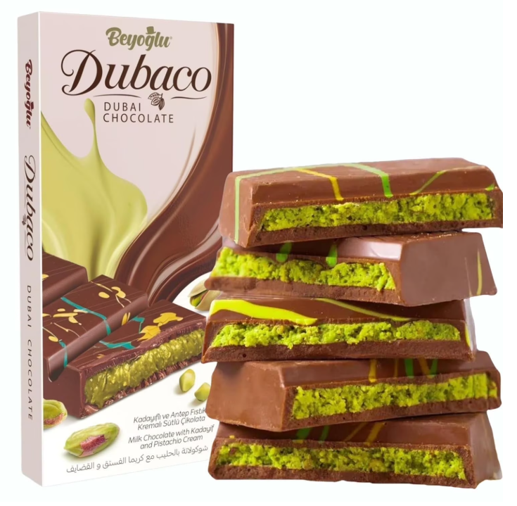 Dubaco Dubai chocolate bar with pistachio cream and kadayif filling, shown with package and sliced chocolate pieces