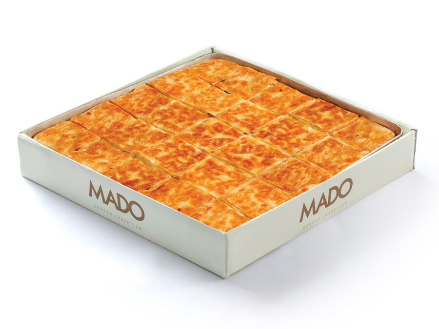 Mado tray of baked pastry cut into portions